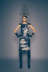 Woman in headwear with spikes