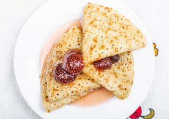 Pancakes with strawberry jam