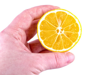 Hand with lemon on a white background