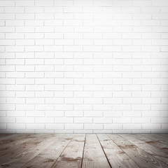 Room interior with brick wall and wooden floor