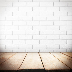 Room interior with brick wall and wooden floor