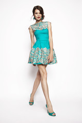 Elegant brunette woman wearing lace dress