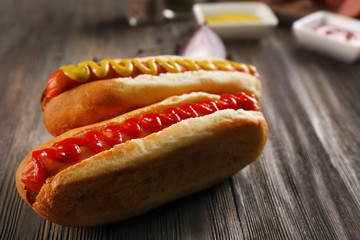 Hot dogs on wooden background