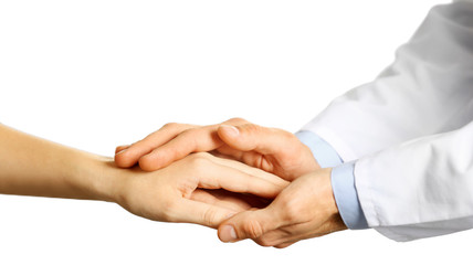 Obraz premium Hand of medical doctor carefully holding patient's hands