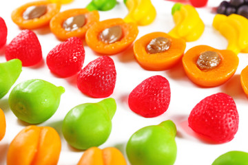 Set of lined colourful fruit jelly sweets, close-up
