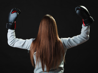 Sport boxer woman in black gloves boxing
