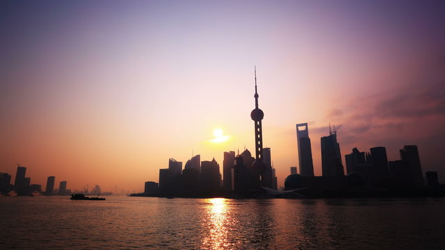 4K(two clips): Time-lapse of Shanghai Sunrise.