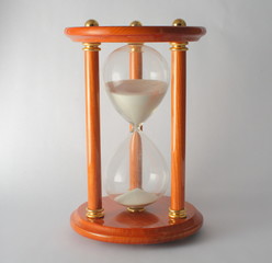 Hourglass on White Background with Sand Falling Moving to show Time