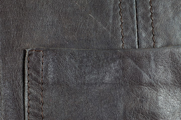 Dark brown real leather surface.