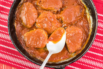 Pork tenderloin with adobo sauce.