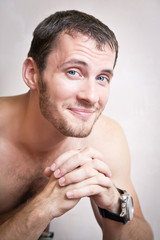 Fototapeta premium Portrait of smiling attractive man close up