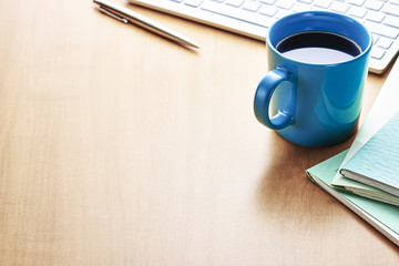 Office supply and coffee. On office desk table.