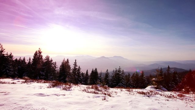 Colorful winter mountains landscape in the sunset light. Right to left slider dolly move.