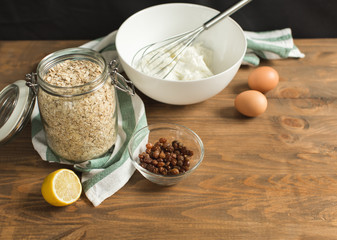Ingredients for dietary cake, oatmeal, cottage cheese, eggs and