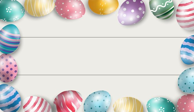 Colorful Easter eggs with white wooden background