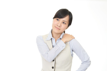 肩こりに悩む女性