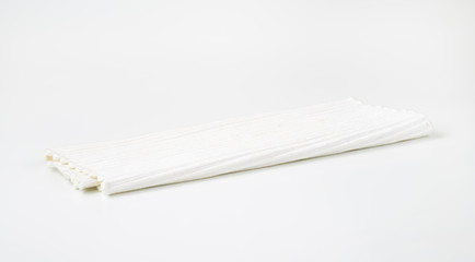 Folded white placemat