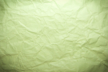 Green crumpled recycle paper background and texture