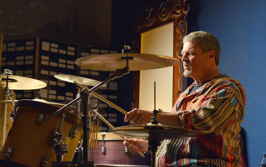 musician happy playing drums