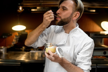 Chef cook tasting lemon dessert