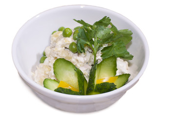 salad with cucumbers, potatoes, eggs, green peas, with mayonnais