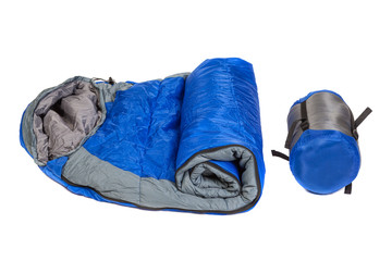 Two of  the same sleeping bags in a compression bags and unpacke