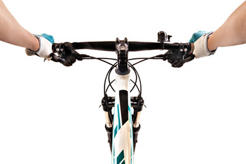 Naklejka premium Close up bicycle rider's hands on a mountain bicycle handlebar.