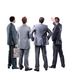 four business mans from the back - looking at something over a white background