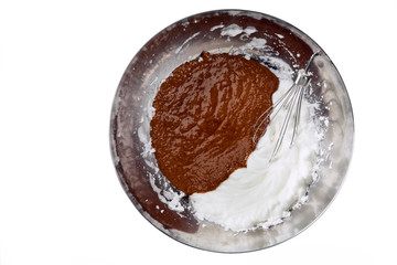 beaten egg whites, liquid chocolate and whisk. Cooking chocolate