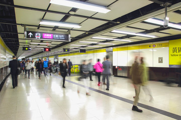 Crowd of passengers walk in Tsim Sha Tsui station on 7 Dec 2015. MTR is the main subway and train...