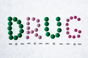 text drug made up of multi-colored pills