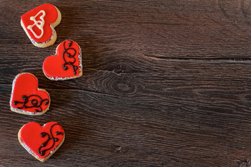 Rustic Valentine cookies on an wooden table