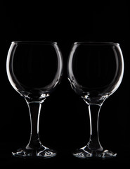 Empty two  wine  glass on black background  in studio  shot