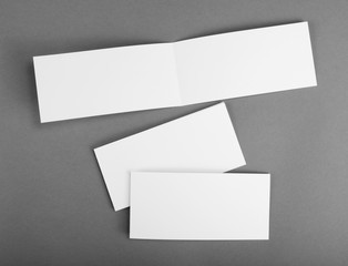 White empty  card on grey to replace your design.