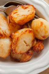 Roast Potatoes cooked in beef fat until crisp and golden a favourite side dish with roast dinners