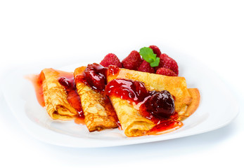 Pancakes with strawberry jam.