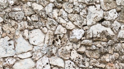 stone wall of old natural tuff