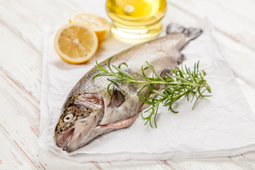 Fresh trout on white wood