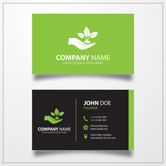 Sprout in a hand icon. Business card template