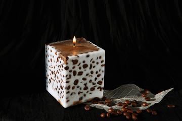 Decorative Handmade candle with coffee beans.