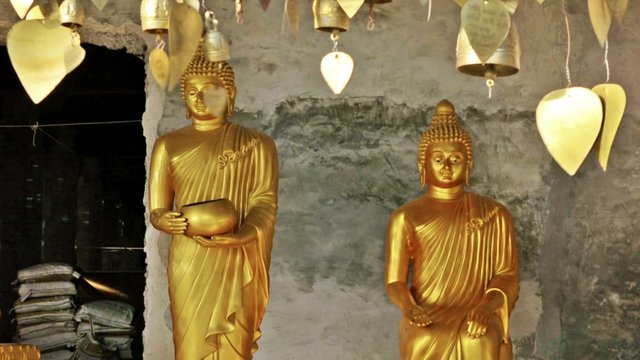Buddha sculptures and bells