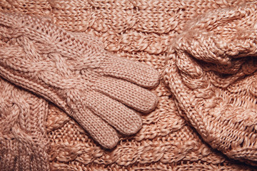 Set of Wool sweater or scarf, hat and gloves texture close up