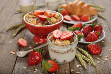 Natural yogurt with granola and strawberries