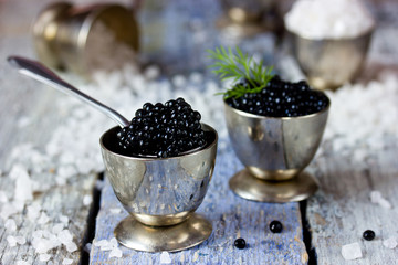 Fototapeta na wymiar Black caviar, luxurious delicacy appetizer. Selective focus