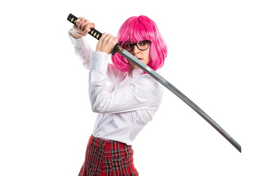 Girl with pink hair holding a katana