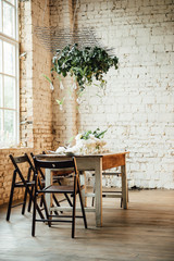 Wedding room decorated loft style with a table and accessories