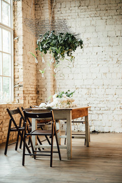 Wedding room decorated loft style with a table and accessories