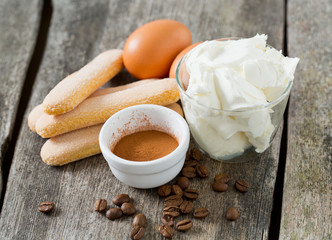 tiramisu ingredients on wooden surface