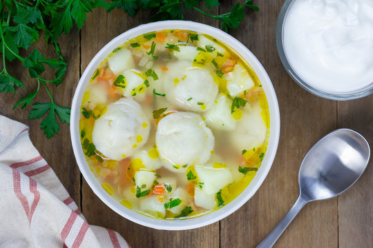 Soup with pelmeni (russian dumplings), top view