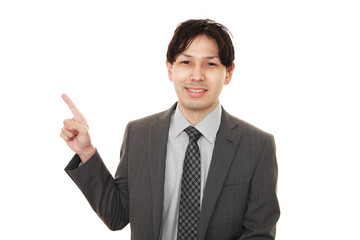 指示する笑顔のビジネスマン